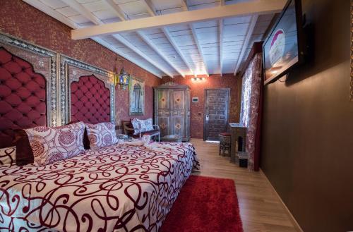 מיטה או מיטות בחדר ב-Hotel El Mirador