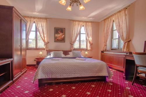 Postelja oz. postelje v sobi nastanitve Hotel Buchlovice