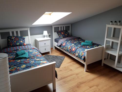 En eller flere senge i et værelse på Horyzont