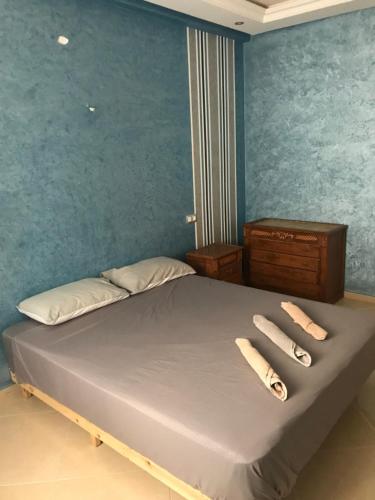 Tanger Jenane Marjane tesisinde bir odada yatak veya yataklar