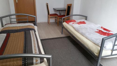 Łóżko lub łóżka w pokoju w obiekcie Casa Mario