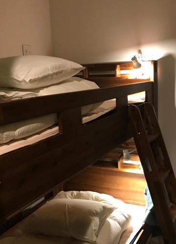 Cama o camas de una habitación en Guest House Proof Point