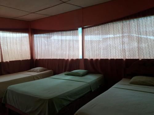 Cama o camas de una habitación en Amazon Golden Snake Lodge