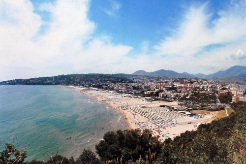 a view of a beach with a crowd of people at I due mari in Gaeta