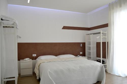 
A bed or beds in a room at B&B Dimora Silvestri
