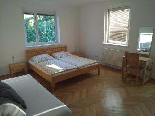 Postel nebo postele na pokoji v ubytování Appartment Lainz
