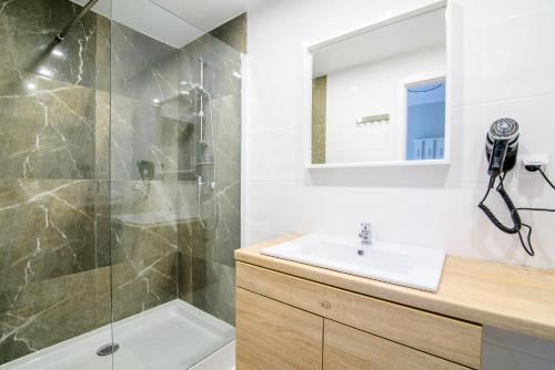 Kylpyhuone majoituspaikassa Apartament Marina Room