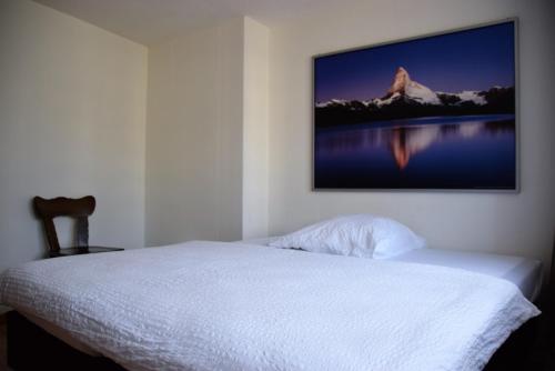 Ein Bett oder Betten in einem Zimmer der Unterkunft Hotel-T8