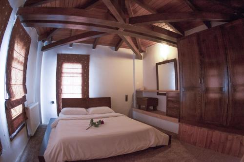 Postel nebo postele na pokoji v ubytování Titagion Hotel