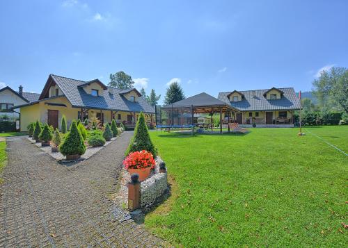 Całoroczne domki apartamentowe "Pod lipą" Izabela Konopelska