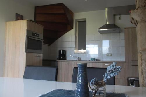 Kuchyň nebo kuchyňský kout v ubytování Hoeve "doodleger"