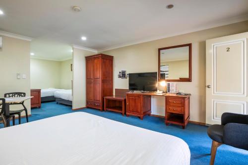 Nightcap at Federal Hotel Toowoombaにあるベッド