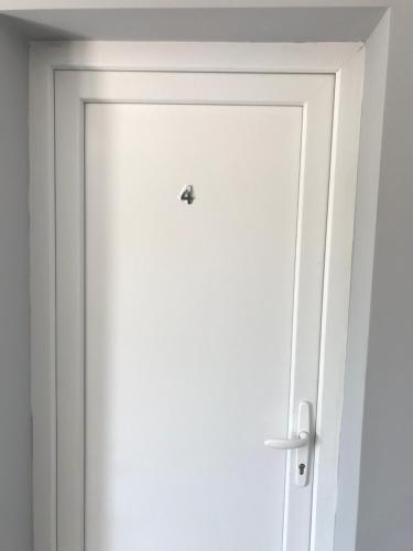 a door with a lock on it in a room at Vila de lux in Bela Crkva