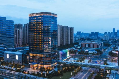 a view of a tall building in a city at Pullman Fuzhou Tahoe in Fuzhou