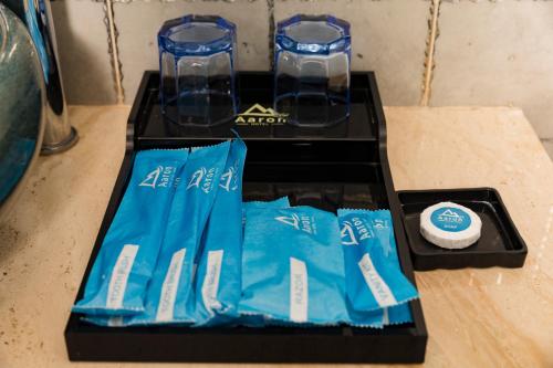 a black box with blue bags on a table at Aaron Hotel in Nha Trang