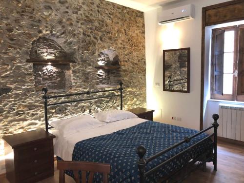 A bed or beds in a room at Il Covo dei Re