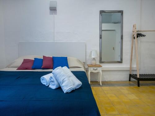 Кровать или кровати в номере Valletta Kampnar City Living