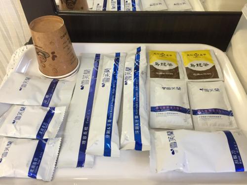 a group of packages of toilet paper in a refrigerator at King Lo Tung Hotel in Luodong