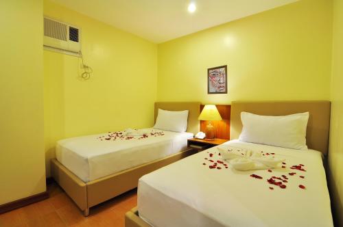 Ένα ή περισσότερα κρεβάτια σε δωμάτιο στο The Well Hotel