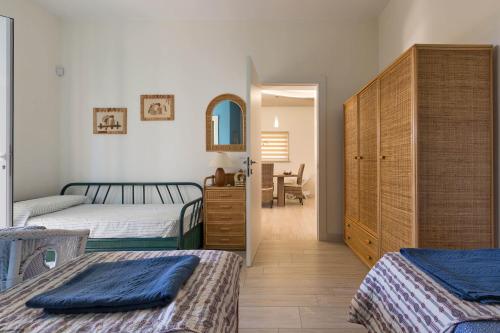 Ένα ή περισσότερα κρεβάτια σε δωμάτιο στο Villa Ariel by BarbarHouse