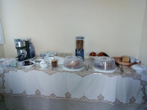 a table with several dishes on top of it at Verde Mare in Alassio