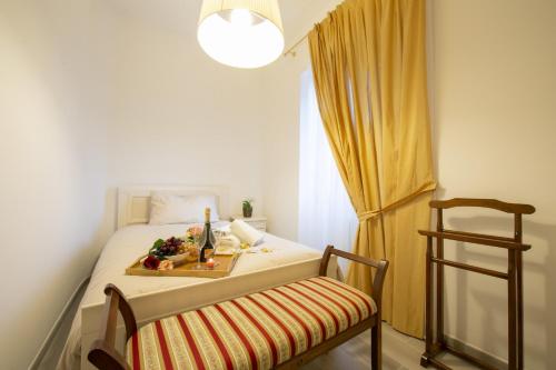 Cama o camas de una habitación en Lenno Giardinetto