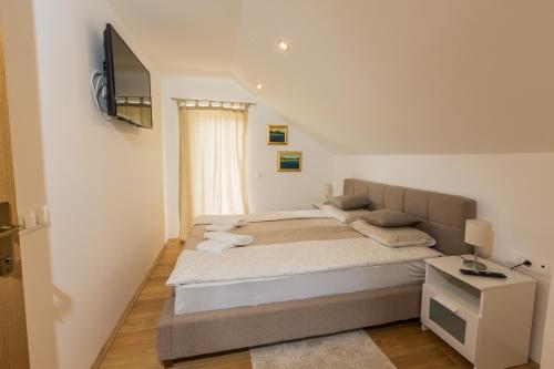 Ένα ή περισσότερα κρεβάτια σε δωμάτιο στο Nonči