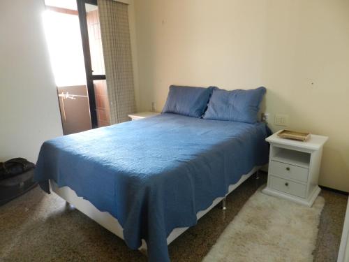 Ένα ή περισσότερα κρεβάτια σε δωμάτιο στο Apartamento Frente mar Meireles