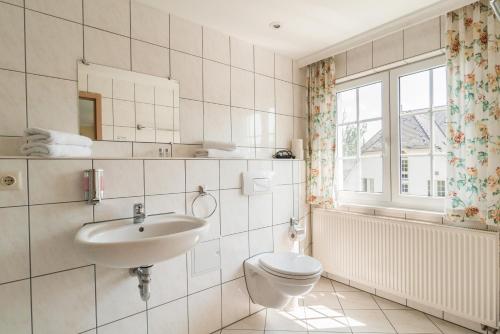 Koupelna v ubytování Hotel Villa am Waldschlösschen