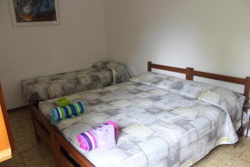 מיטה או מיטות בחדר ב-villino in montagna