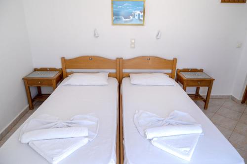 Кровать или кровати в номере Hotel Mimoza