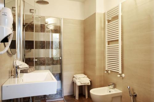 a bathroom with a sink and a shower at Asseu in Sestri Levante