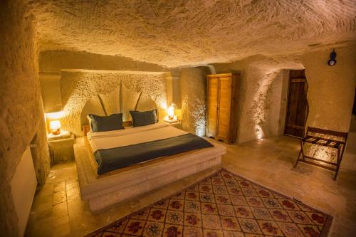 Postel nebo postele na pokoji v ubytování Azure Cave Suites - Cappadocia