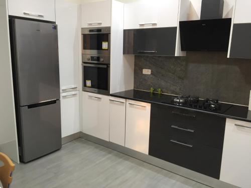 Η κουζίνα ή μικρή κουζίνα στο Altavista Appartment