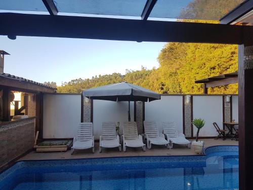 Πισίνα στο ή κοντά στο Pousada Requinte da Mantiqueira