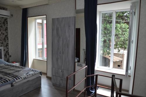 เตียงในห้องที่ Guest house UTA