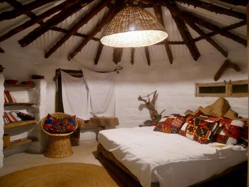 Postelja oz. postelje v sobi nastanitve Hillside Retreat – Africa Amini Life