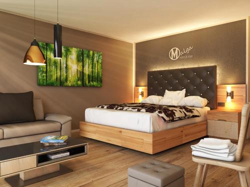 Postel nebo postele na pokoji v ubytování Aparthotel Malga