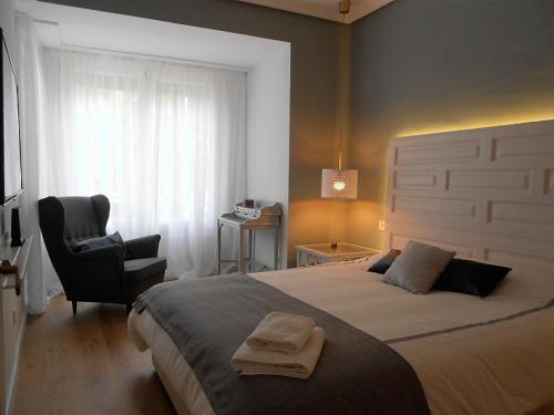 Ένα ή περισσότερα κρεβάτια σε δωμάτιο στο La Parada