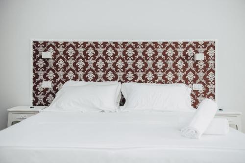 Cama ou camas em um quarto em Elysium B&B