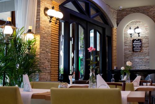 Un restaurant sau alt loc unde se poate mânca la Ambra Boutique Hotel & Bistro