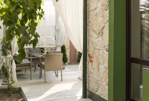 an open door to a dining room with a table at Weekend Boutique Hotel in Chişinău