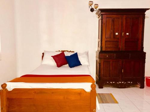 Cama o camas de una habitación en Antique Tourists Lodge