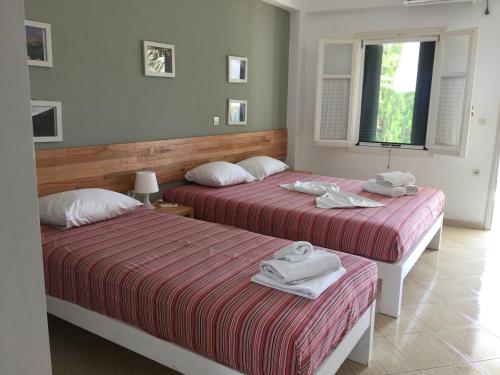 Postel nebo postele na pokoji v ubytování Green House