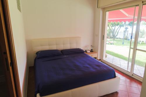 Voodi või voodid majutusasutuse Chiaro di Luna toas