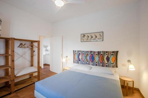 Postel nebo postele na pokoji v ubytování Marettimo Residence
