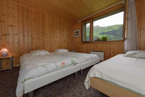 Postel nebo postele na pokoji v ubytování Au Bivouac de Napoléon et Spa
