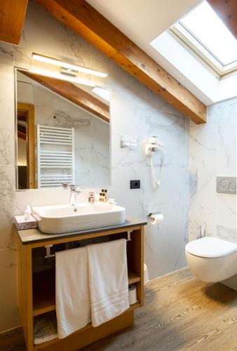 Un baño de Hotel Cirelle Suite & Spa