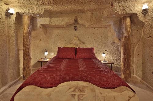 Кровать или кровати в номере Vista Cave Hotel
