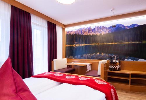 Una cama o camas en una habitación de Hotel Cirelle Suite & Spa